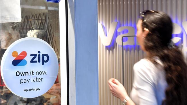 BRISBANE, AUSTRALIA - NewsWire Photos April 23, 2021: Business stock images of Buy now pay later Zip and Afterpay signs on shop fronts in Brisbane.Picture: NCA NewsWire / John Gass