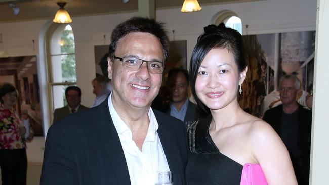 Michel Elias Germani, pictured with wife Coco Germani, is accused of orchestrating an armed robbery at his Germani Jewellery store as part of an insurance fraud. His wife is not accused of any wrongdoing or involvment.