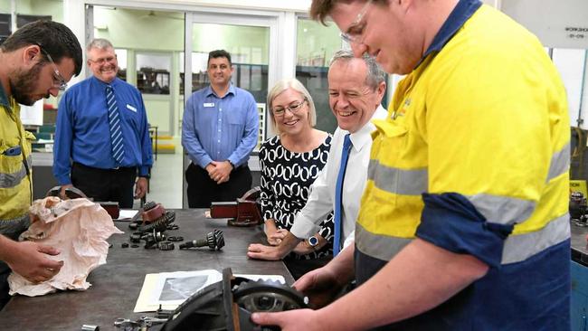 EDUCATION BOOST: Member for Bundaberg Leanne Donaldson and Opposition Leader Bill Shorten chat to third year diesel fitter Cale Harrison at Bundaberg Tafe yesterday. Picture: Mike Knott BUN091117SHORTEN1