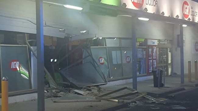 The damage left behind after thieves reversed a truck into Epping IGA.