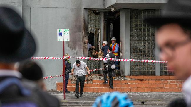 Members outside the fire-bombed Adass Israel Synagogue in Melbourne. The fact people are not safe praying in a place of worship is shocking. Picture Asanka Ratnayake/Getty Images