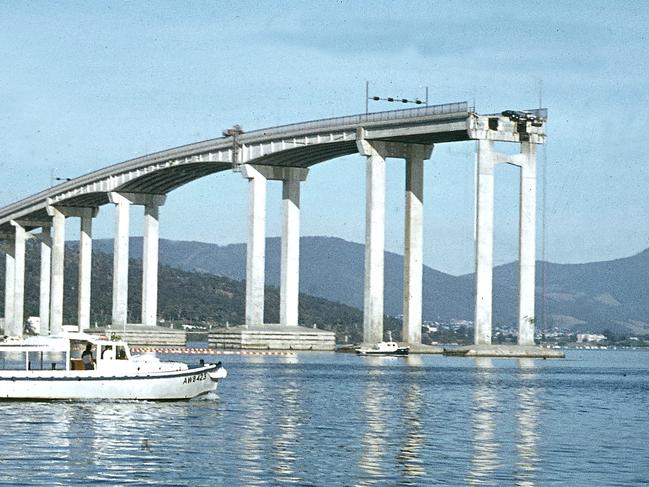 Picture Peter Rees Historical Hobarts Bicentenary 1804 - 2004 Special Supplement Accidents Water Tasman Bridge Disaster January 5th 1975 the bridge after being hit by the ship lake Illawarra