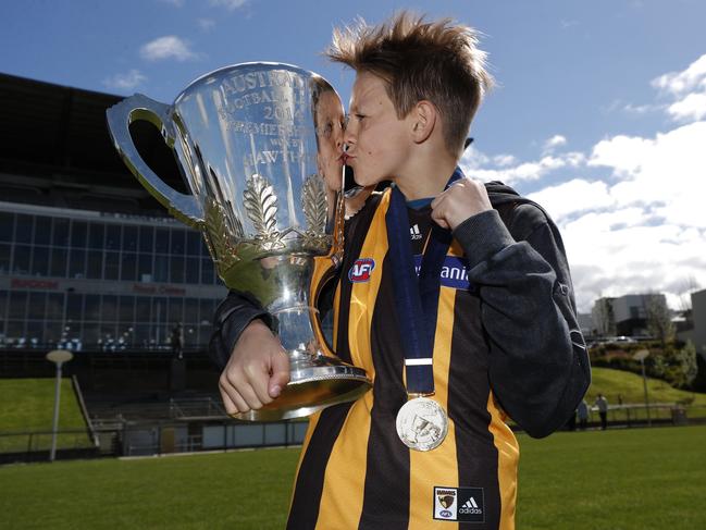 Embargoed until midnight Nov 13th.  Cooper Hodge recreated his father Luke Hodge's pose from the 2014 Toyota AFL Grand Final.  (Photo by Michael Willson/AFL Photos)