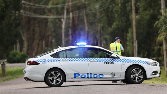 Hideaway Drive has been blocked off and a homicide investigation launched at Salt Ash after a man's body was found in a car. Picture: NCA NewsWire / Peter Lorimer