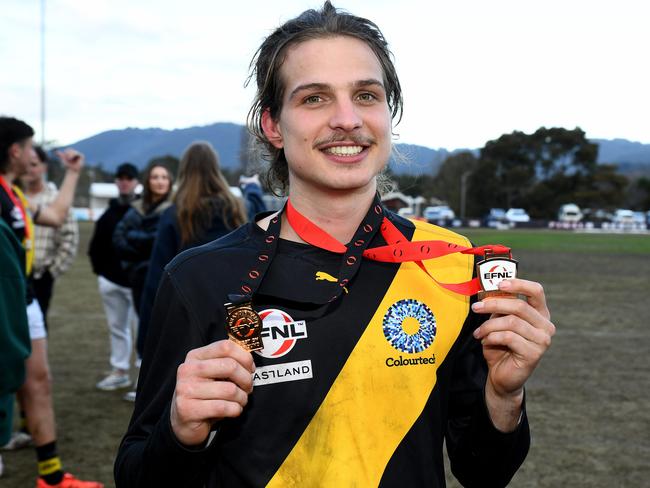 Jesse Cherry of Mitcham poses with his premiership and best on ground medals after the 2023 Eastern Football Netball League 1st Division Grand Final. (Photo by Josh Chadwick)