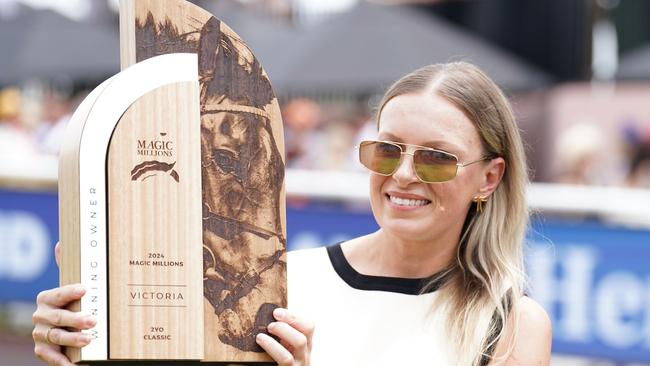 Lucy Yeomans with the spoils of Invincible Woman’s Magic Millions VIC 2YO Classic win at Caulfield Heath. Picture: Scott Barbour / Racing Photos