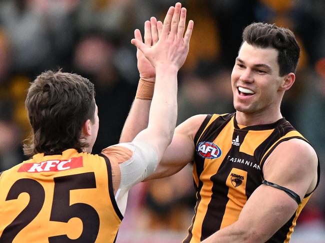 HOBART, AUSTRALIA - JULY 23: Jaeger O'Meara of the Hawks celebrates a goal during the round 19 AFL match between the North Melbourne Kangaroos and the Hawthorn Hawks at Blundstone Arena on July 23, 2022 in Hobart, Australia. (Photo by Steve Bell/Getty Images)