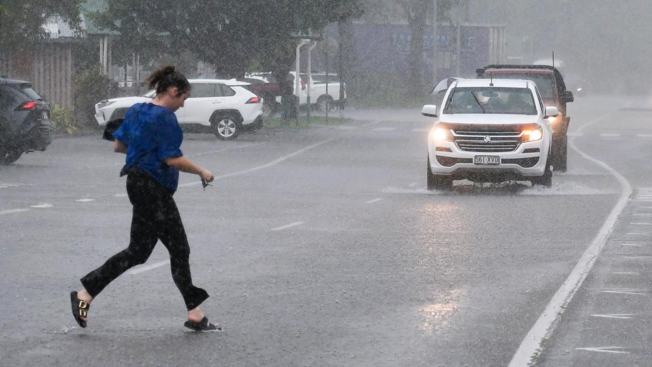 Heavy rain falling in Lannercost St in the Ingham CBD on Tuesday as a moderate flood warning was issued for the Herbert River. Picture: Cameron Bates