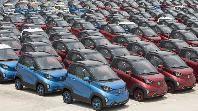 Baojun E100 electric vehicles sit parked in the parking lot of the SAIC-GM-Wuling Automobile Co Baojun Base plant, a joint venture between SAIC Motor Corp, General Motors Co and Liuzhou Wuling Automobile Industry Co in Liuzhou, Guangxi province, China. Picture: Qilai Shen/Bloomberg