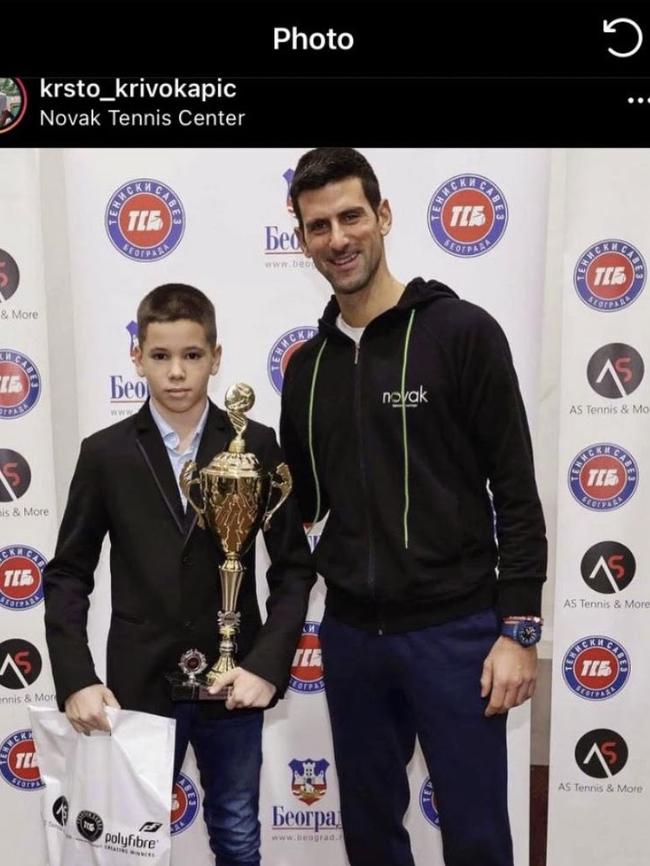 Djokovic photo with a fan, posted on December 17th after his PCR test. Picture: Instagram