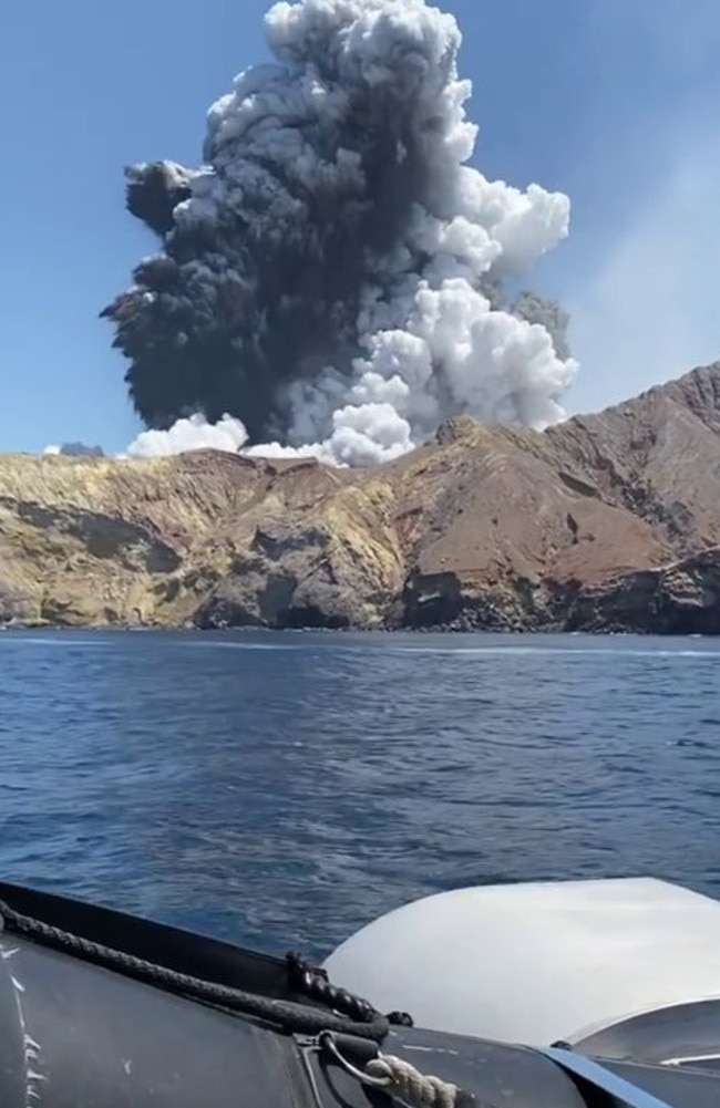 The volcanic plume fills the air moments after the eruption.