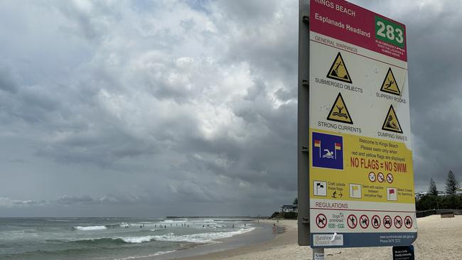 A sign at Kings Beach where a tragic death of a swimmer occurred on February 13. Picture: Letea Cavander