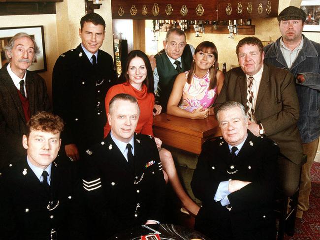 Back L-R Peter Benson, Jason Durr, Clare Calbraith, Derek Fowlds, Tricia Penrose, Geoffrey Hughes and David Lonsdale. Front L-R Mark Jordan, Philip Franks and William Simons, 06/03.