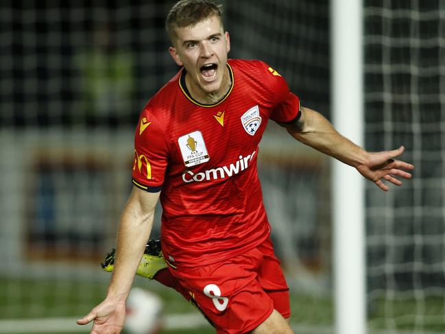 Riley McGree of Adelaide celebrates scoring the winning goal during the FFA Cup Semi Final match between Central Coast Mariners and Adelaide United at Central Coast Stadium in Gosford, Wednesday, October 2, 2019. (AAP Image/Darren Pateman) NO ARCHIVING, EDITORIAL USE ONLY