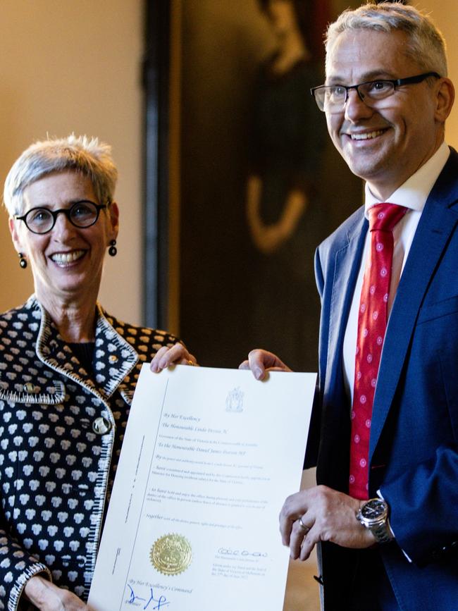 Governor Linda Dessau and Danny Pearson MP pose for a picture during a swearing-in ceremony for new Victorian government ministers at Government House in Melbourne. Picture: Diego Fedele