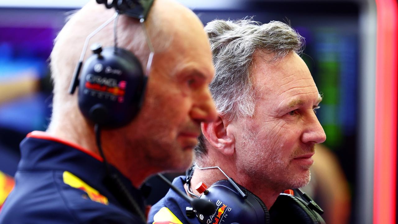 BAHRAIN, BAHRAIN - FEBRUARY 22: Oracle Red Bull Racing Team Principal Christian Horner and Adrian Newey, the Chief Technical Officer of Oracle Red Bull Racing look on in the garage during day two of F1 Testing at Bahrain International Circuit on February 22, 2024 in Bahrain, Bahrain. (Photo by Mark Thompson/Getty Images)