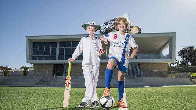 Sam Newson-Smith and Brodie Strauss in front of the new West Epping Park pavilion at Epping. Picture:Troy Snook