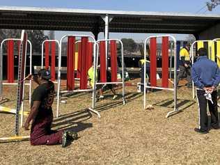 Residents of the Balund-a diversionary program helped the Tenterfield Show Society to give facilities a new lick of paint during the time they were displaced from the program's Tabulam property due to a bushfire. Picture: Corrective Services NSW