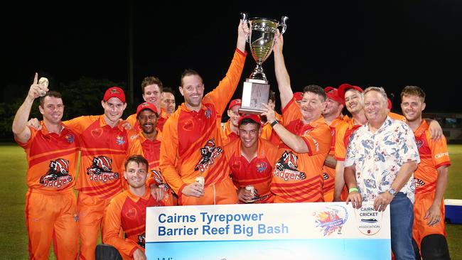 Piccone Badgers captain Jake Roach and owner John Piccone are presented with the trophy and winner's cheque from Australian cricket great Ian Healy after winning the Barrier Reef Big Bash grand final match against the Twomey Schrieber Thunder at Griffiths Park, Manunda. Picture: Brendan Radke