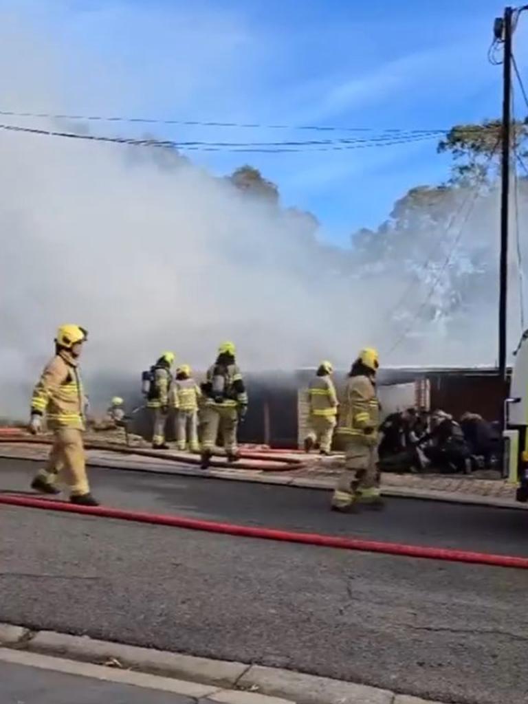 Fire crews arrived to find the single-storey house engulfed in smoke and flames, and two occupants of the home already evacuated. Picture: 7NEWS