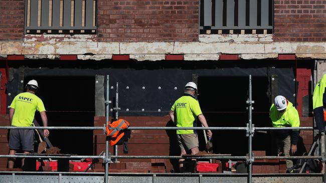 Construction workers at the site of a combined residential and commercial development in Surry Hills in Sydney. Picture: Getty Images