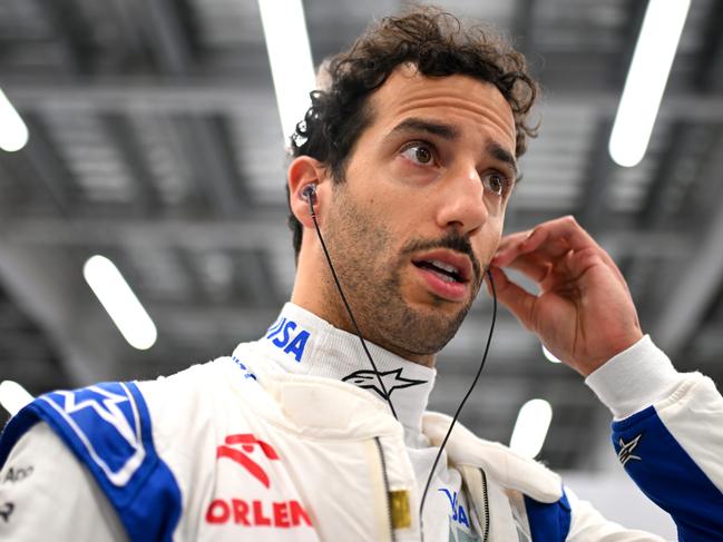 JEDDAH, SAUDI ARABIA - MARCH 08: Daniel Ricciardo of Australia and Visa Cash App RB prepares to drive in the garage during qualifying ahead of the F1 Grand Prix of Saudi Arabia at Jeddah Corniche Circuit on March 08, 2024 in Jeddah, Saudi Arabia. (Photo by Rudy Carezzevoli/Getty Images)