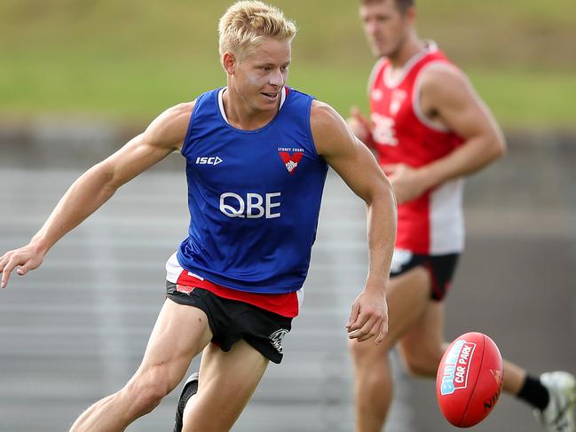 SYDNEY, AUSTRALIA - FEBRUARY 06: Isaac Heeney of the Swans chases the ball during a Sydney Swans AFL training session at Henson Park on February 06, 2019 in Sydney, Australia. (Photo by Cameron Spencer/Getty Images)