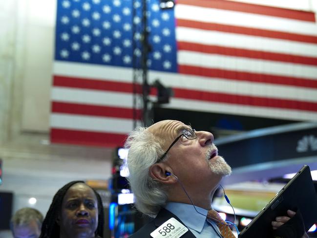 Traders and financial professionals work at the opening bell on the floor of the New York Stock Exchange in New York City. Picture: AFP