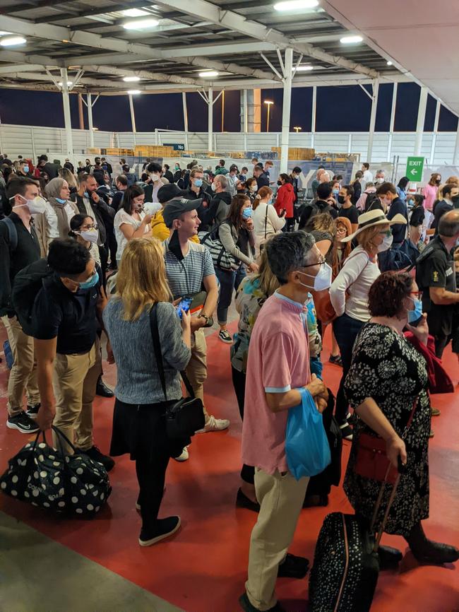 Little social distancing at Sydney Airport as domestic travel returns big time. Picture: James Ryall/Twitter