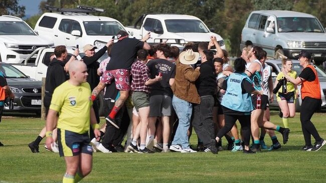 Fans swamp Nathan Gardiner after he kicked his 100th goal. Picture: Facebook