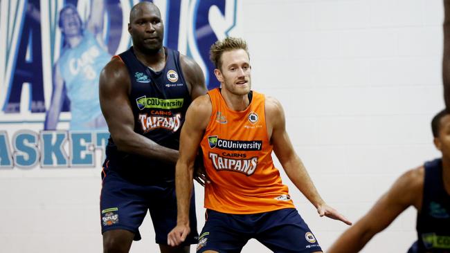 Taipans training ahead of their first NBL game of the season. Nate Jawai and Mitchell Young. PICTURE: STEWART MCLEAN