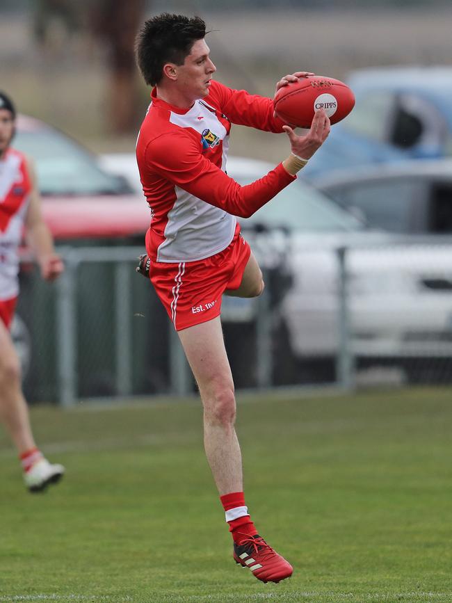 Clarence’s Keren Howlett marks the ball. Picture: LUKE BOWDEN