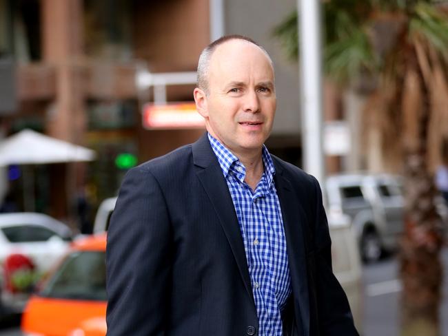 A2 Milk CEO Peter Nathan enters the federal court in Sydney to fight dairy farmers. Picture: John Grainger