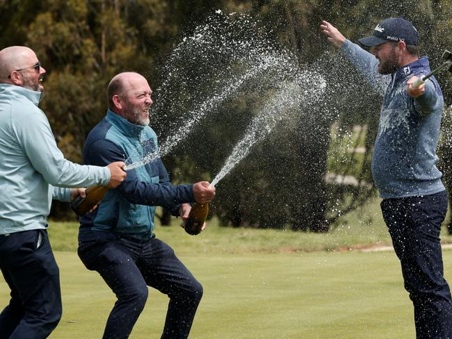 Toowoomba's Sam Eaves (right) celebrates his PGA Professionals Championship National Final title win.