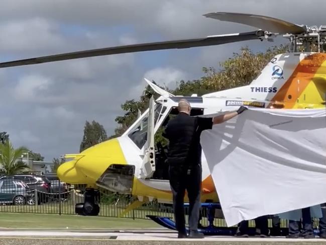 Critically injured Ross Tighe arrives at Mackay Base Hospital via RACQ CQ Rescue. Picture: Zoe Devenport