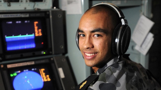 Able Seaman Combat Systems Operator Brendan Read in the operations room on HMAS Parramatta. Picture: Royal Navy, Damian Pawlenko