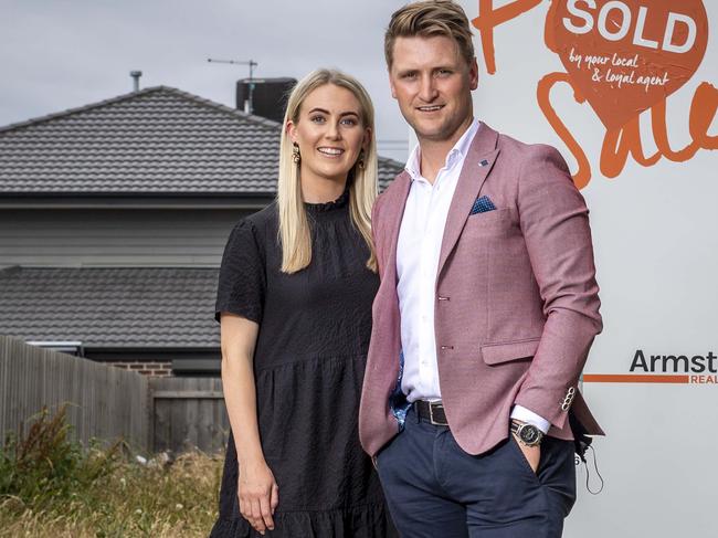 Josh McDonald and his partner Maddison Bannerman are buying land to build their second home. The State government has announced stamp duty discounts in the new budget. Picture: Jake Nowakowski