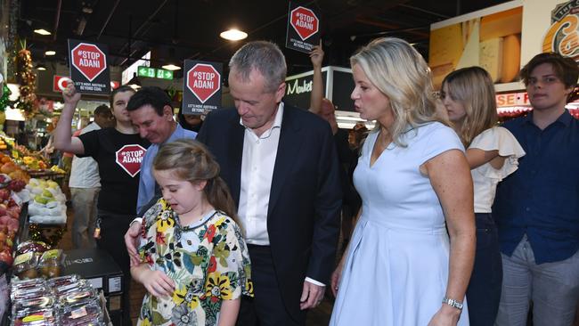 Opposition leader Bill Shorten together with his wife Chloe and daughter Clementine at the Adelaide Central Market on Saturday. AAP Image/Lukas Coch 