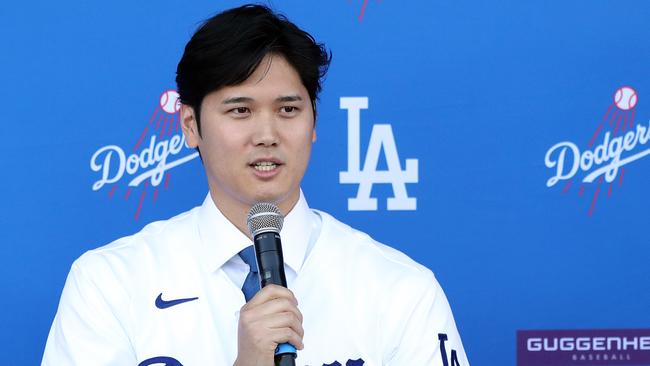 Yamamoto follows in the footsteps of Japanese superstar Shohei Ohtani in signing with the Dodgers. (Photo by Meg Oliphant/Getty Images)