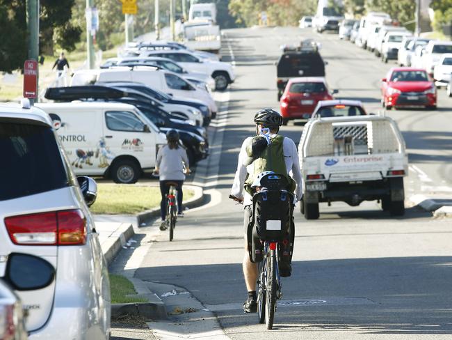 Cyclists on Darley Road near Sydney’s Centennial Park. A mix of separated cycleways, footpaths and roads can lead to confusion for some cyclists and motorists. Picture: John Appleyard