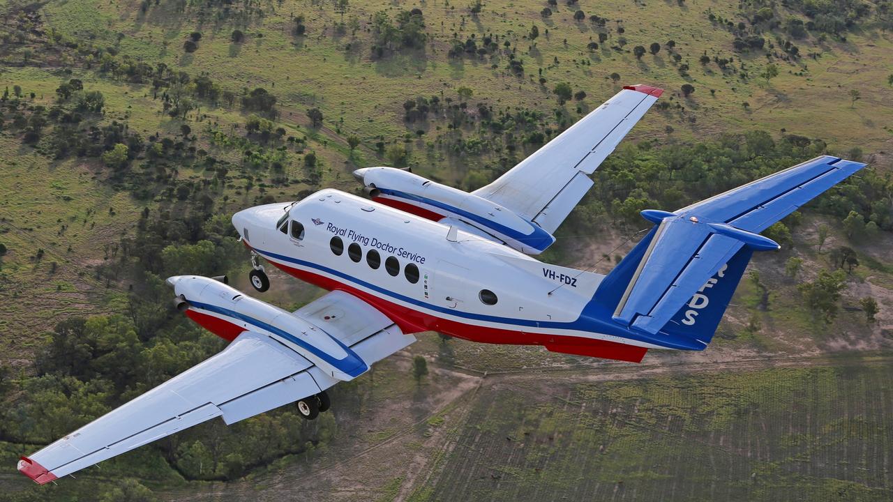 A woman in her 20s suffered a significant arm injury after being pinned under a vehicle and was flown by the Royal Flying Doctors Service to Townsville University Hospital in a stable condition.