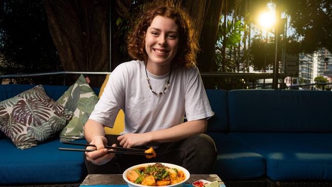 Sarah Pollock enjoys a laksa at the Deck Bar. Picture: Che Chorley