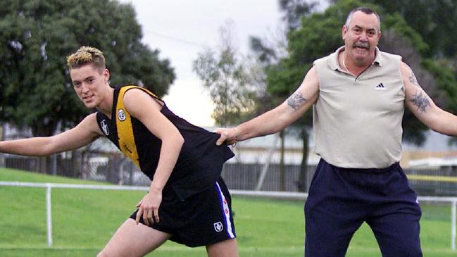 McGhie with his dad former VFL strongman Robert ‘Bones’ McGhie.