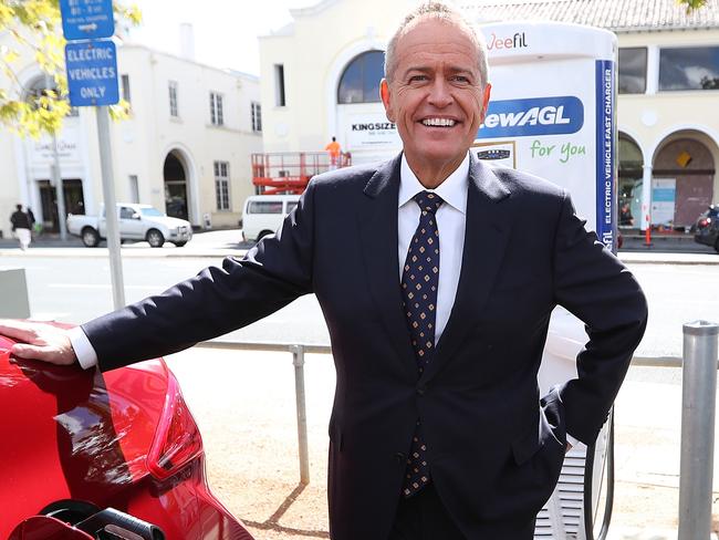 The Leader of the Opposition, Bill Shorten charging an electric car at the launch of Labor's Climate Change Action Plan at ACTEWAGL Electric Car Charging Station in Canberra.. Picture Kym Smith