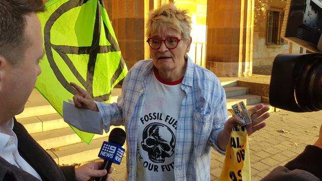 Extinction Rebellion protester Heinke Weber outside the Adelaide Magistrates Court following her release on bail for graffiti charges. Picture: Sean Fewster