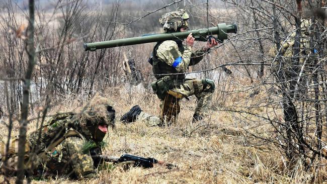 Ukrainian Armed Forces soldiers prepare for conflict in an unknown part of Ukraine. Picture: AFP