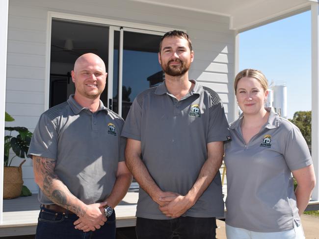 Aussie Tiny Homes and Cabins' Brendan Vine, Jeremy Power and Emma Power. Picture: Aden Stokes