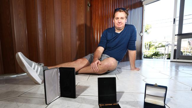 Champion swimmer Brenton Rickard had 100 medals stolen from his home in Bundall. Picture: Jason O'Brien