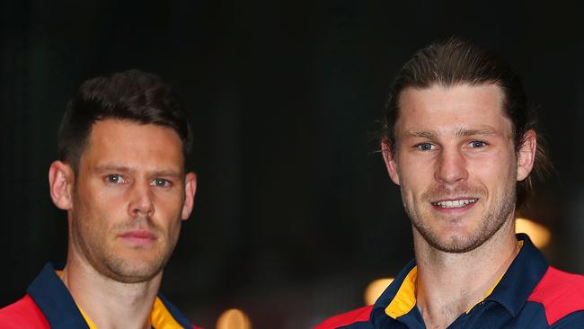 Crows recruits Bryce Gibbs, rights, moves from the No. 4 jumper he wore at Carlton to No. 6 at Adelaide and Sam Gibson advances from No. 43 at North Melbourne to No. 20 with the Crows. Picture: Scott Barbour (Getty Images)