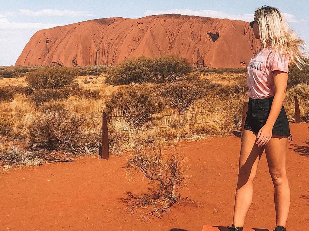 Tegan on top of Uluru before it closed to climbers this week.